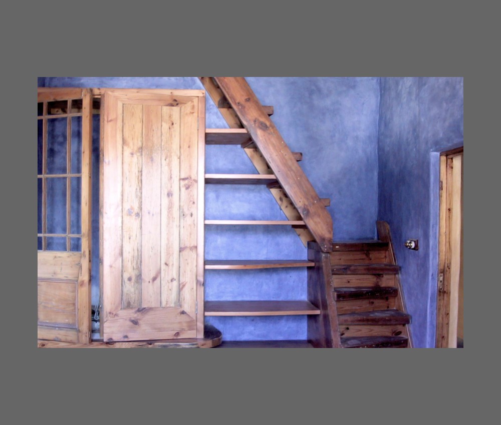 bedroom with stairs to attic 2